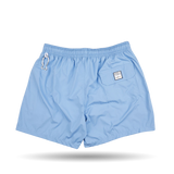 A Light Blue Microfiber Madeira Swim Short with a white Fedeli logo, perfect for luxury casual wear.
