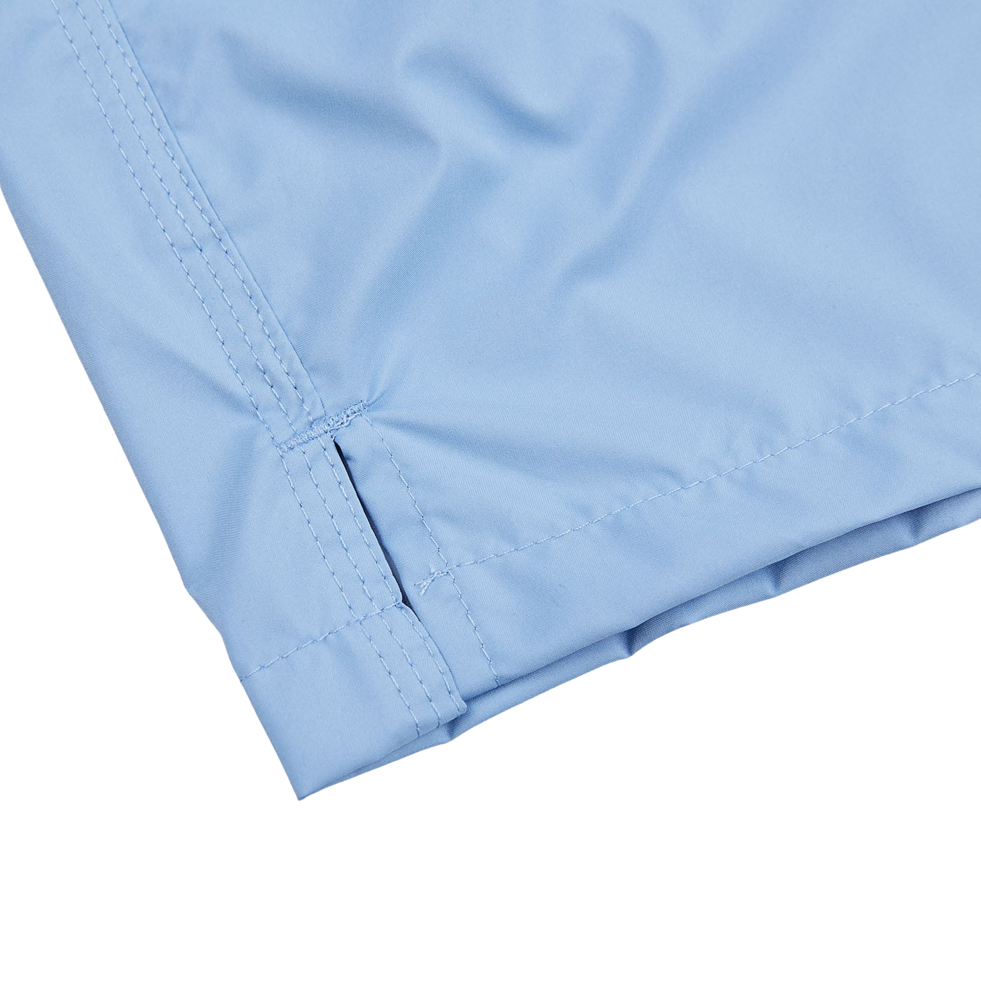 An up-close view of Fedeli Light Blue Microfiber Madeira Swim Shorts with a zipper.