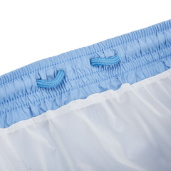 A close up of Fedeli's Light Blue Microfiber Madeira Swim Shorts with mesh lining.