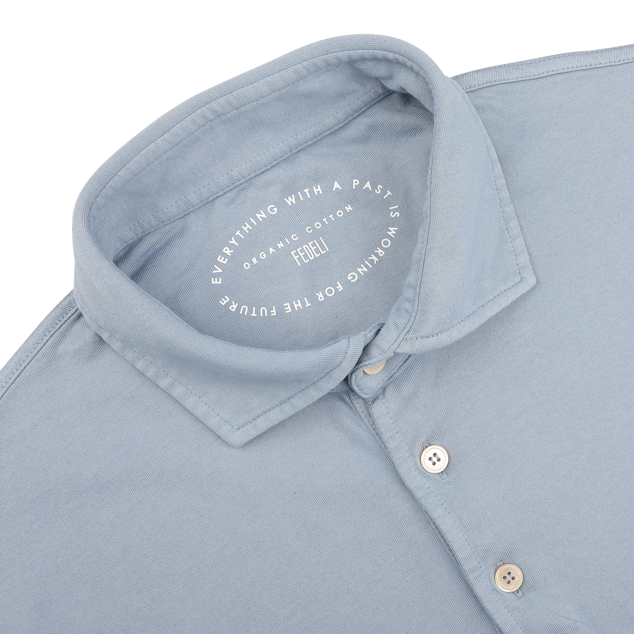 The Fedeli Light Blue Organic Cotton Polo Shirt, crafted from organic Giza cotton, showcases a circular imprint with text about organic cotton and the future.