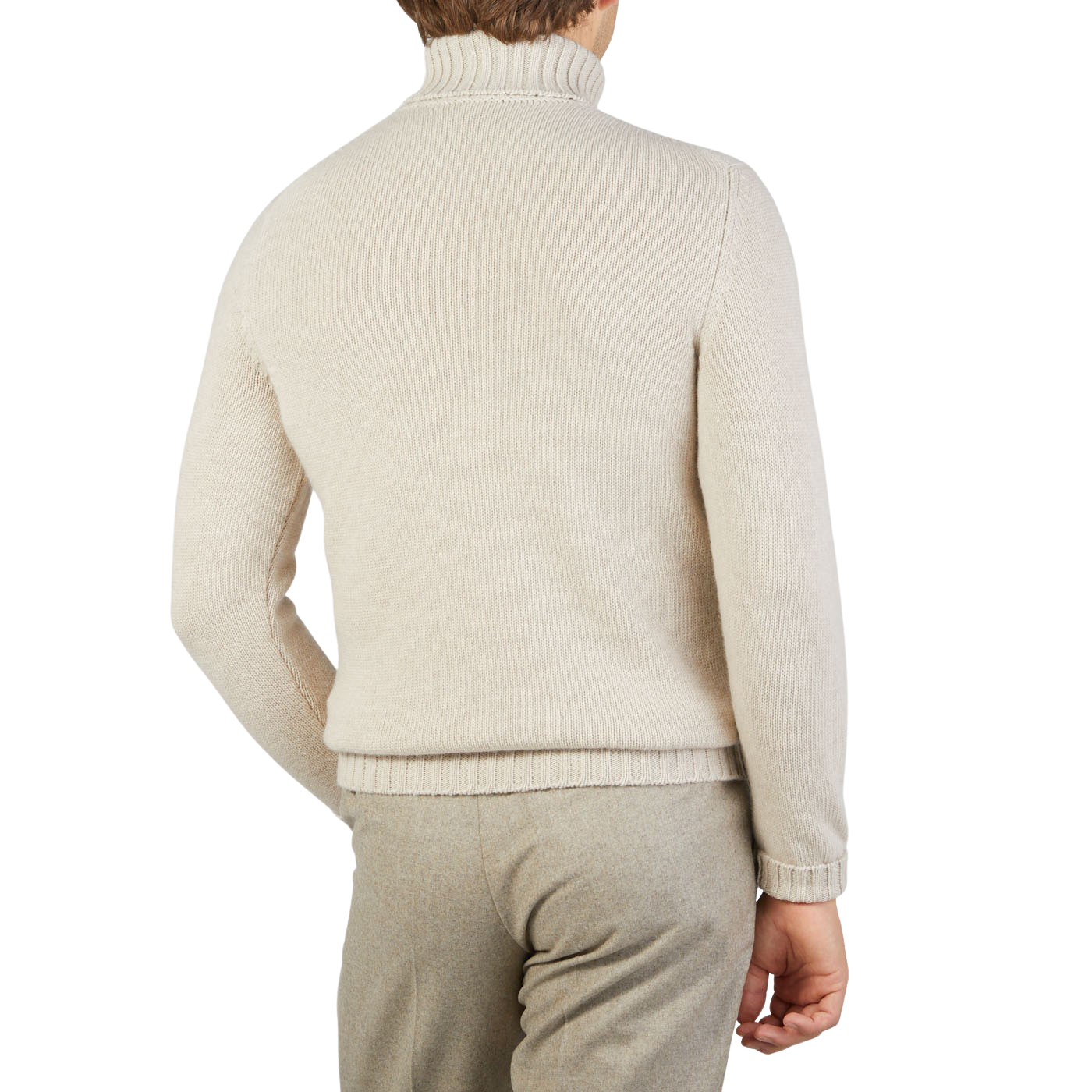 A person wears the Fedeli Natural Beige Wool Cashmere Rollneck sweater with matching pants, seen from the back against a plain background.