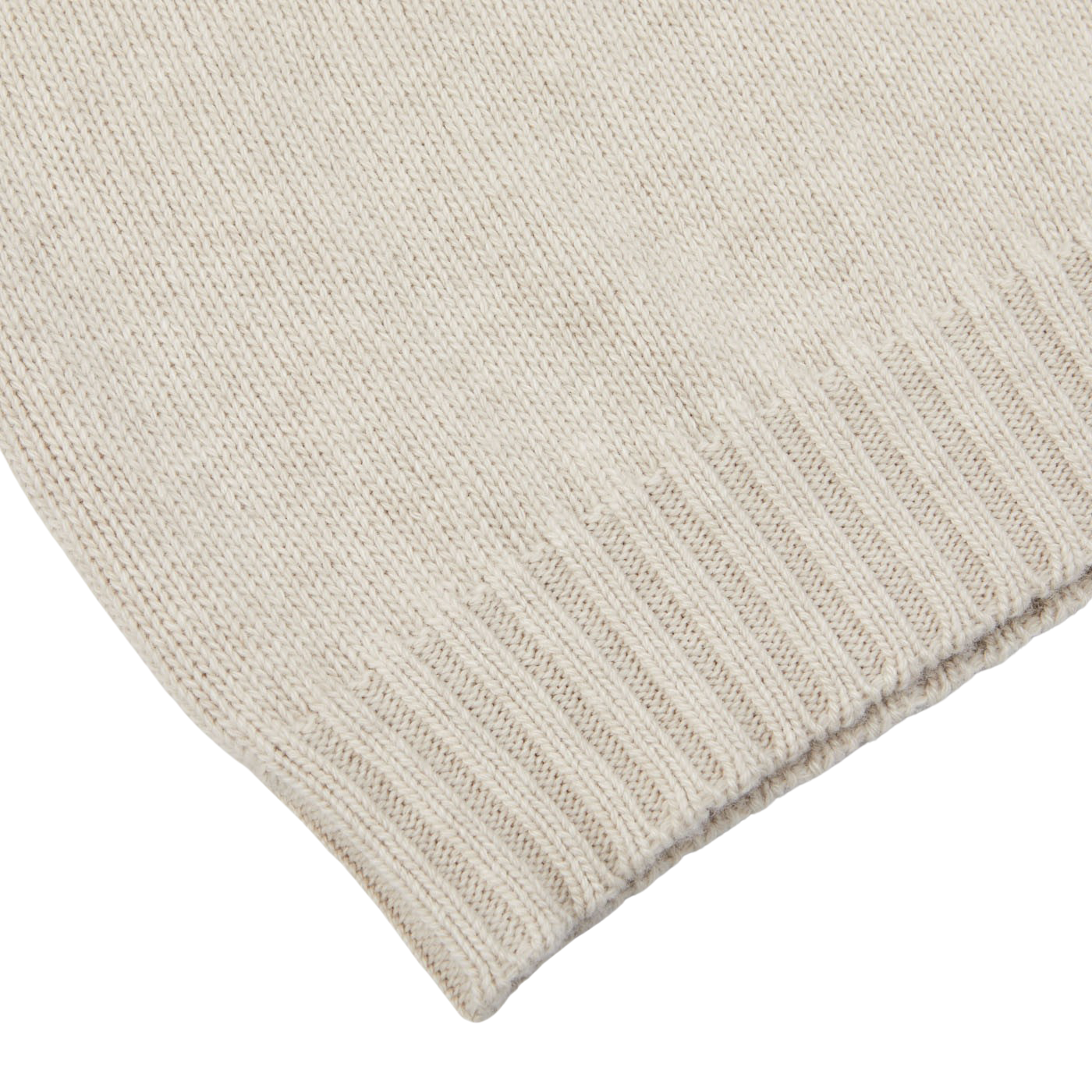 Close-up of the Fedeli Natural Beige Wool Cashmere Rollneck, a knitted masterpiece with ribbed detailing at the edge, showcased on a pristine white background.