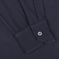 Close-up view of the cuff on a Navy Blue Organic Cotton LS Polo Shirt by Fedeli, crafted from organic Giza cotton and featuring a single round button.