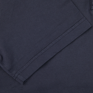 A close up of a Fedeli Navy Blue Organic Cotton Polo Shirt.