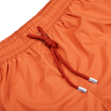 Fedeli Rust Brown Microfiber Madeira Swim Shorts with a drawstring and mesh lining.