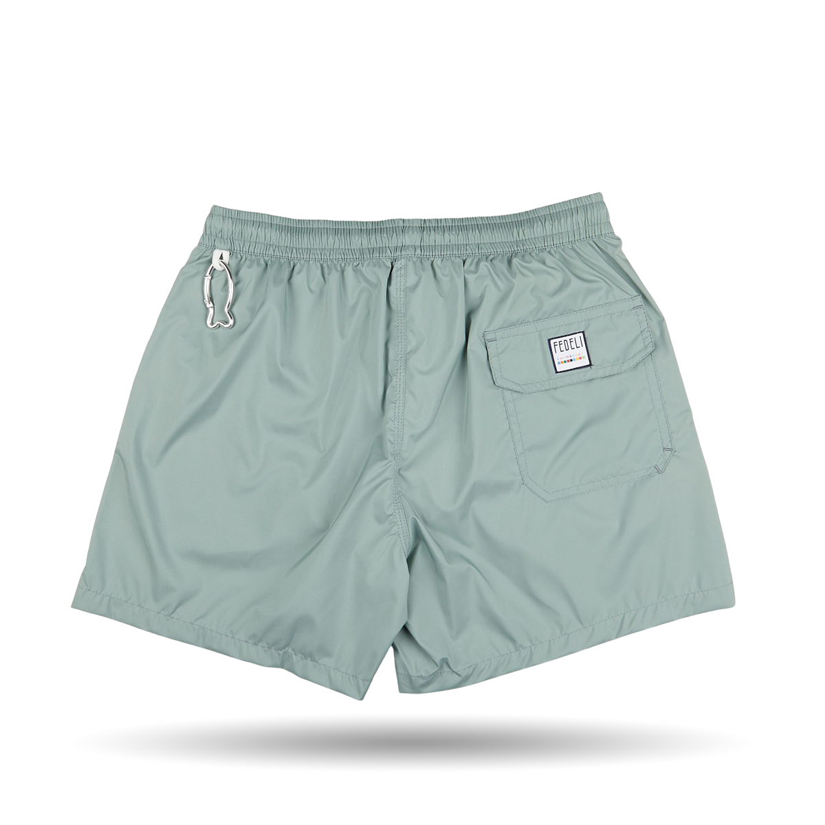 A pair of Sage Green Madeira Microfiber swim shorts by Fedeli in light teal quick-dry microfiber, featuring an elastic waistband, a white embroidered logo on the left leg, and a patch pocket with a label on.