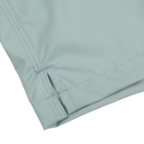 Close-up of Sage Green Madeira Microfiber Swim Shorts by Fedeli showing detailed stitching and a folded seam.