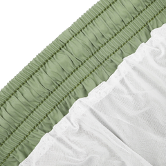 Close-up of Fedeli's Sage Green Madeira Microfiber Swim Shorts, showcasing luxurious sage green fabric with a textured white mesh overlay.