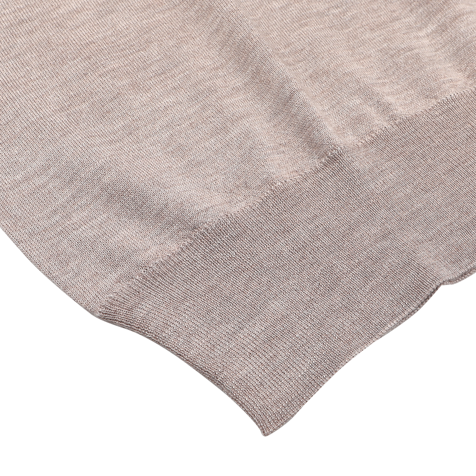 A close-up of the Taupe Beige Cashmere Silk 1/4 Zip Sweater by Fedeli reveals its luxurious cashmere-silk blend fabric with a ribbed hem.