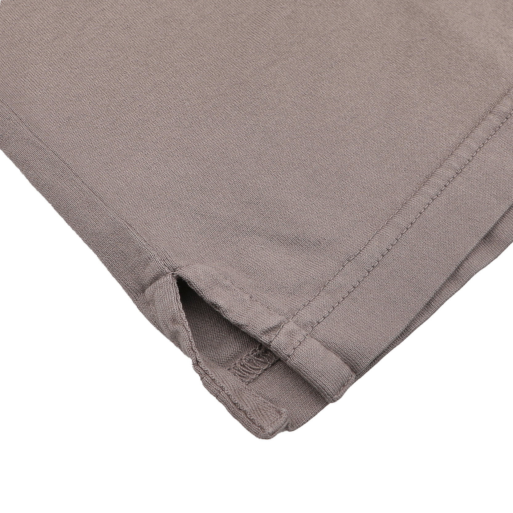 Close-up of the hem of a Taupe Beige Organic Cotton LS Polo Shirt by Fedeli, featuring a small side slit and visible stitching on a white background, showcasing the elegance of luxury casual-wear.