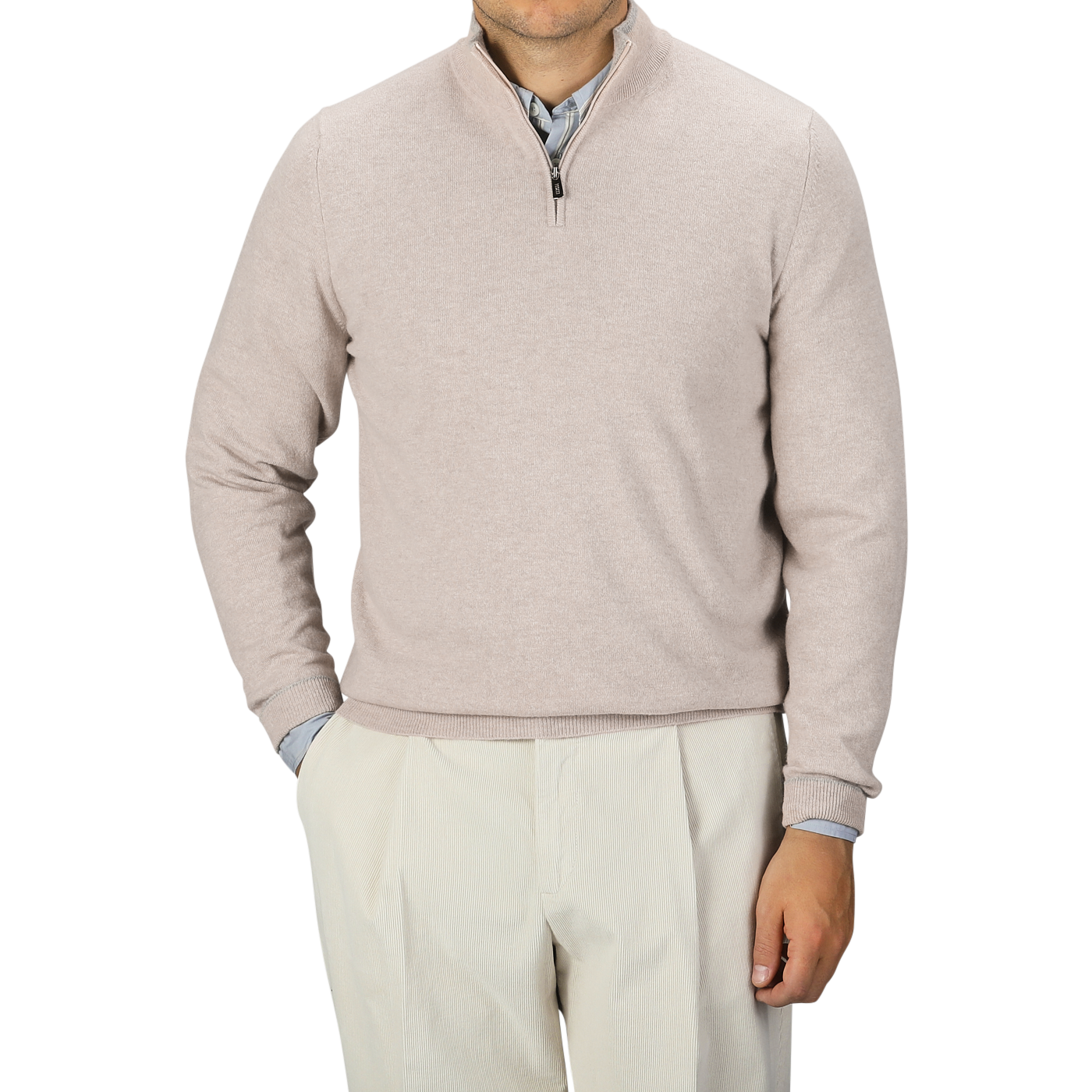 A person is wearing the Fedeli Taupe Beige Wool Cashmere 1/4 Zip Sweater over a blue collared shirt and light-colored trousers. They stand against a plain background, with their face not visible in the image.