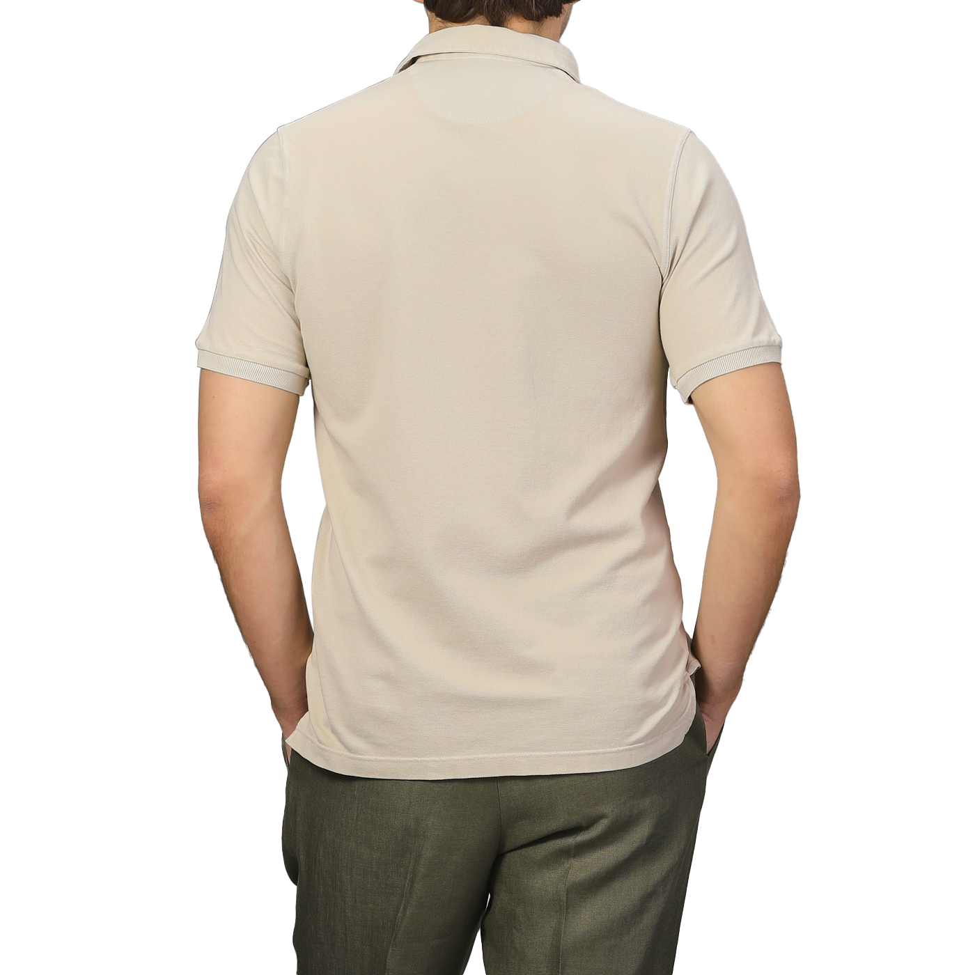 A person is shown from the back wearing a Fedeli Washed Beige Cotton Pique Polo Shirt and olive green pants against a plain gray background.