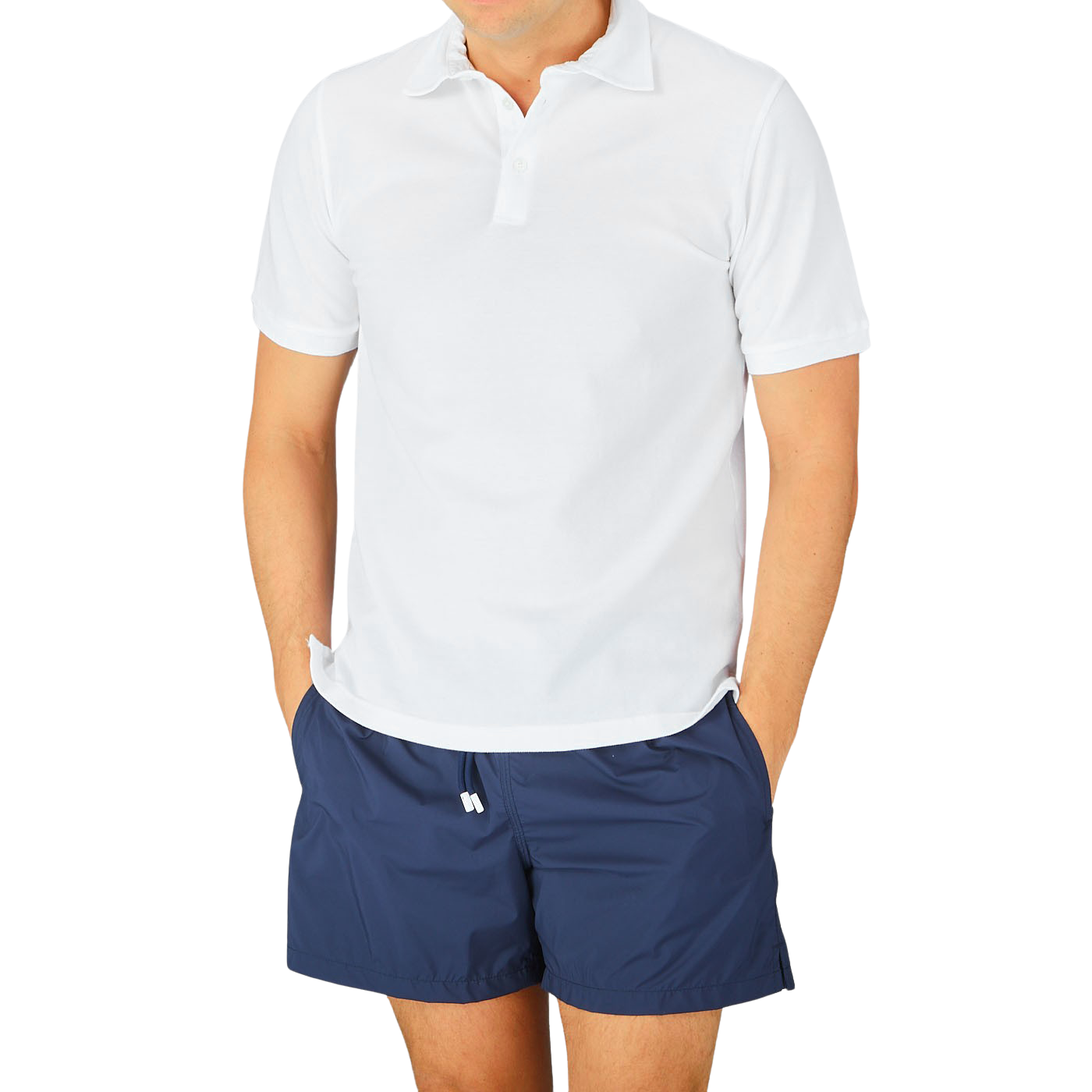 A man wearing a Fedeli washed white cotton pique polo shirt.