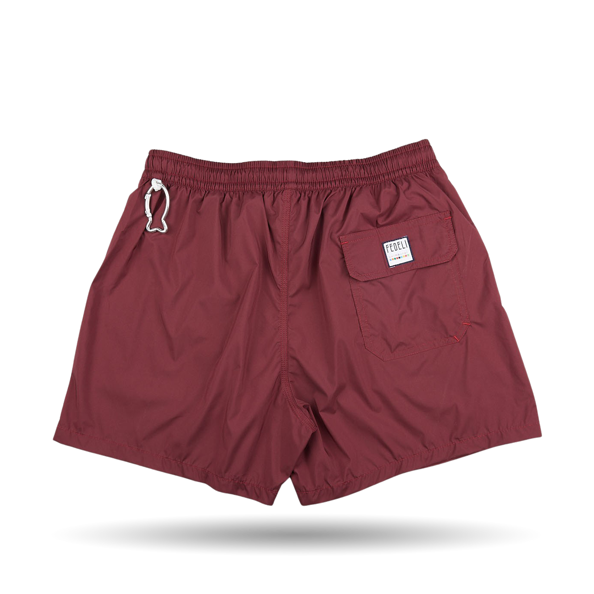 The Fedeli Wine Red Microfiber Madeira Swim Shorts are men's luxury casual wear.