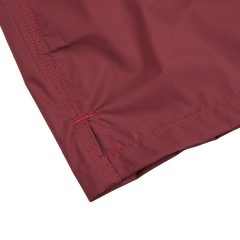 The back of a Fedeli Wine Red Microfiber Madeira Swim Shorts with wine red stitching.