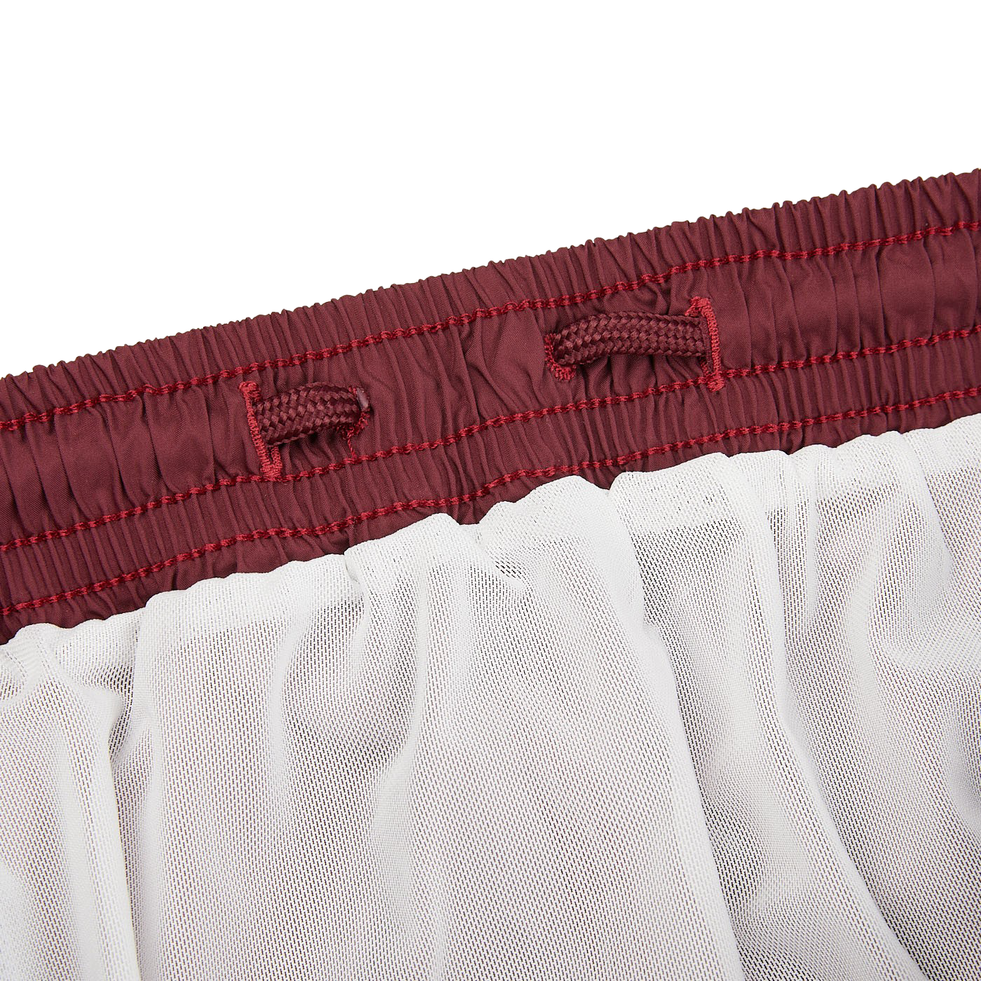 A close up of a Fedeli Wine Red Microfiber Madeira Swim Shorts.