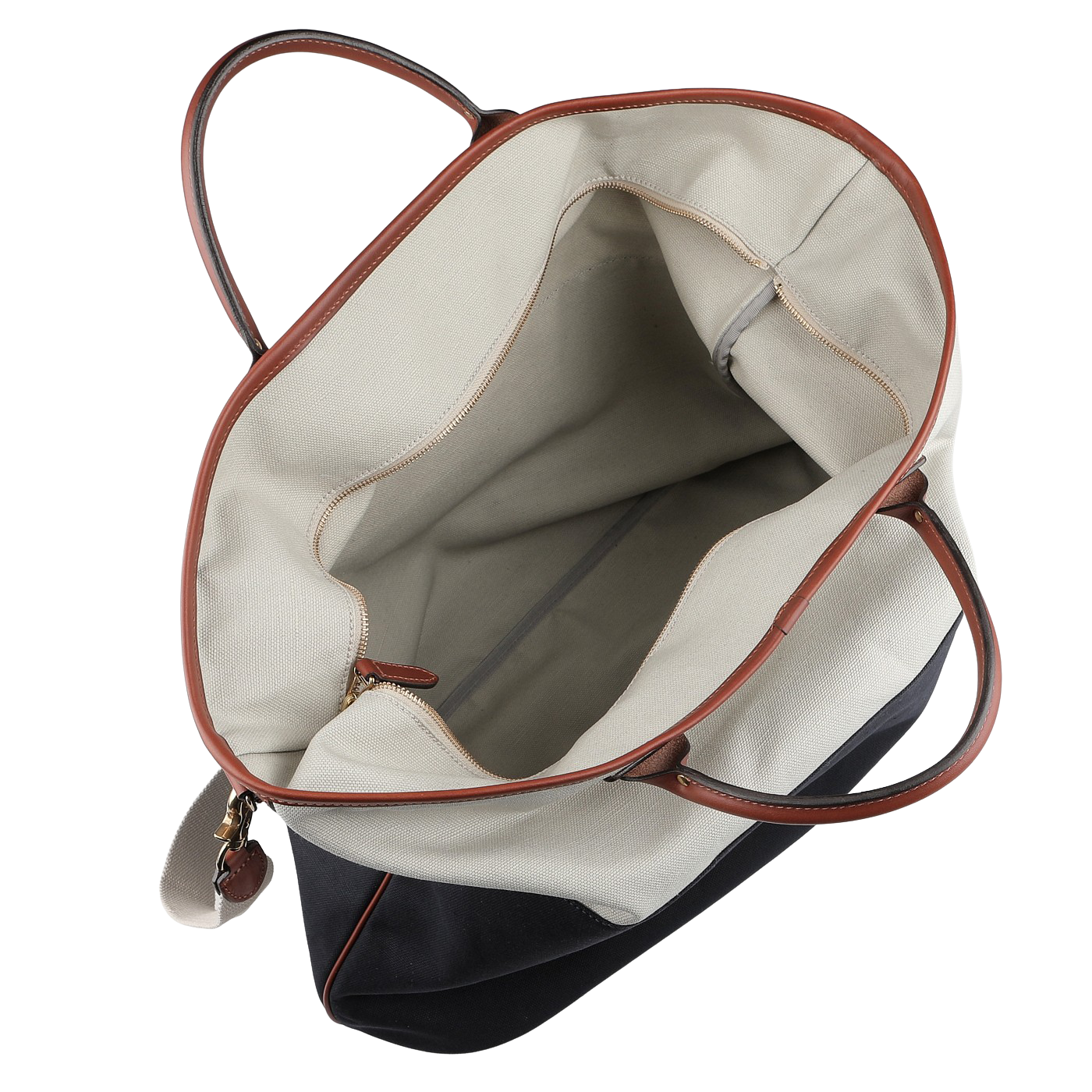 The Navy Grey Cotton Canvas Leather Travel Tote by Felisi is a roomy accessory crafted from robust cotton canvas, complemented by luxurious vacchetta calf leather handles and trim. Its bright interior is perfect for accommodating all your essentials.