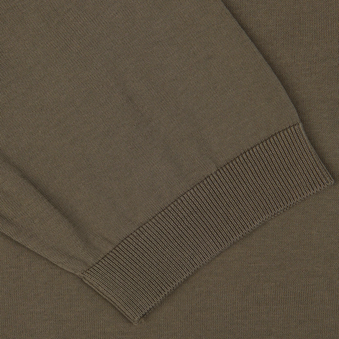 Close-up of a ribbed cuff on a Filippo de Laurentiis Olive Green Crepe Cotton Polo Shirt.