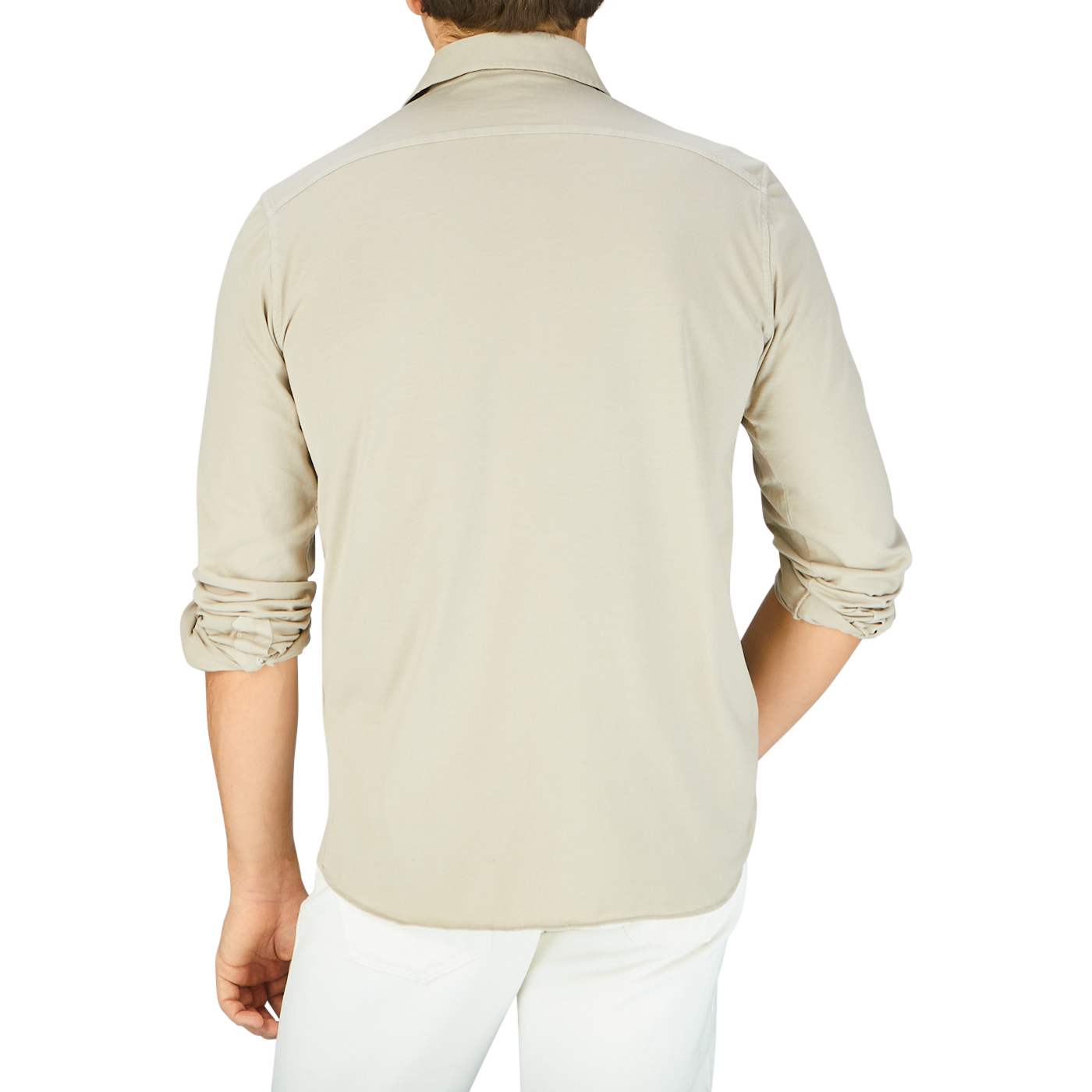 The back view of a man wearing a Filippo de Laurentiis Ciottollo Beige Cotton Jersey Knitted Shirt and white pants.
