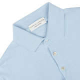 Light blue seasonal polo shirt with a focus on the collar and top buttons, crafted in Filippo de Laurentiis crepe cotton.