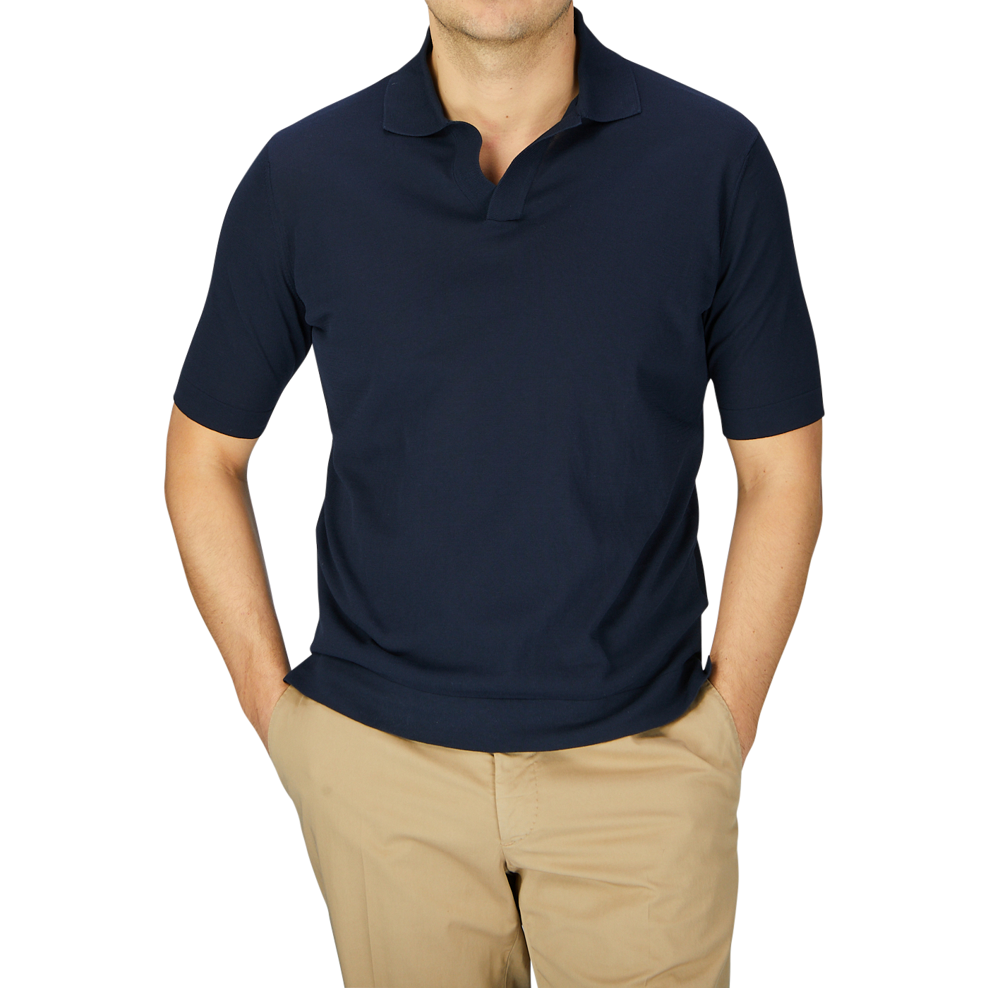 A man in a slim fit Filippo de Laurentiis navy blue Crepe Cotton Polo Shirt and beige trousers stands against a light gray background, with the frame cropped at his neck and knees.