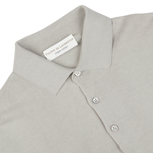 Nebbia Grey Crepe Cotton polo shirt from Filippo de Laurentiis with visible brand label on collar and button-up detail.
