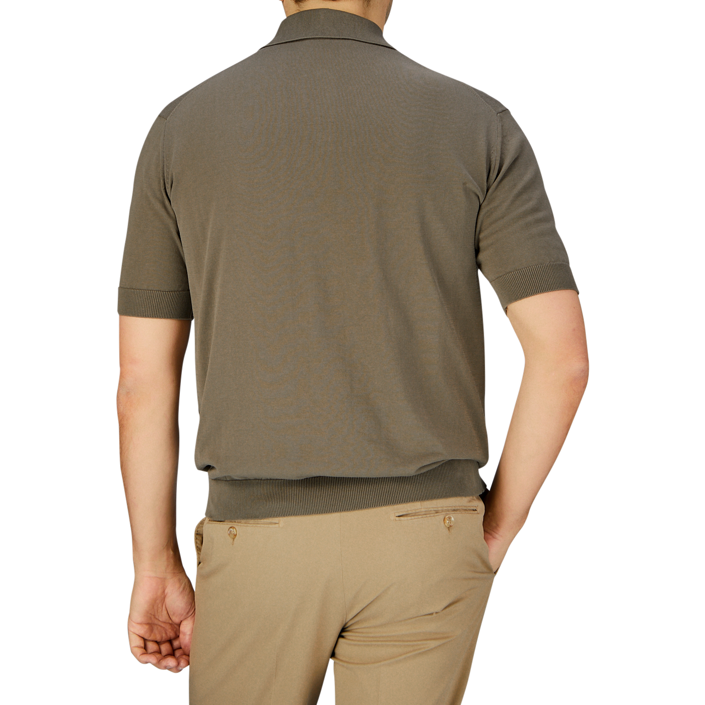 Man seen from the back wearing a seasonal Filippo de Laurentiis olive green crepe cotton polo shirt and beige crepe cotton pants.