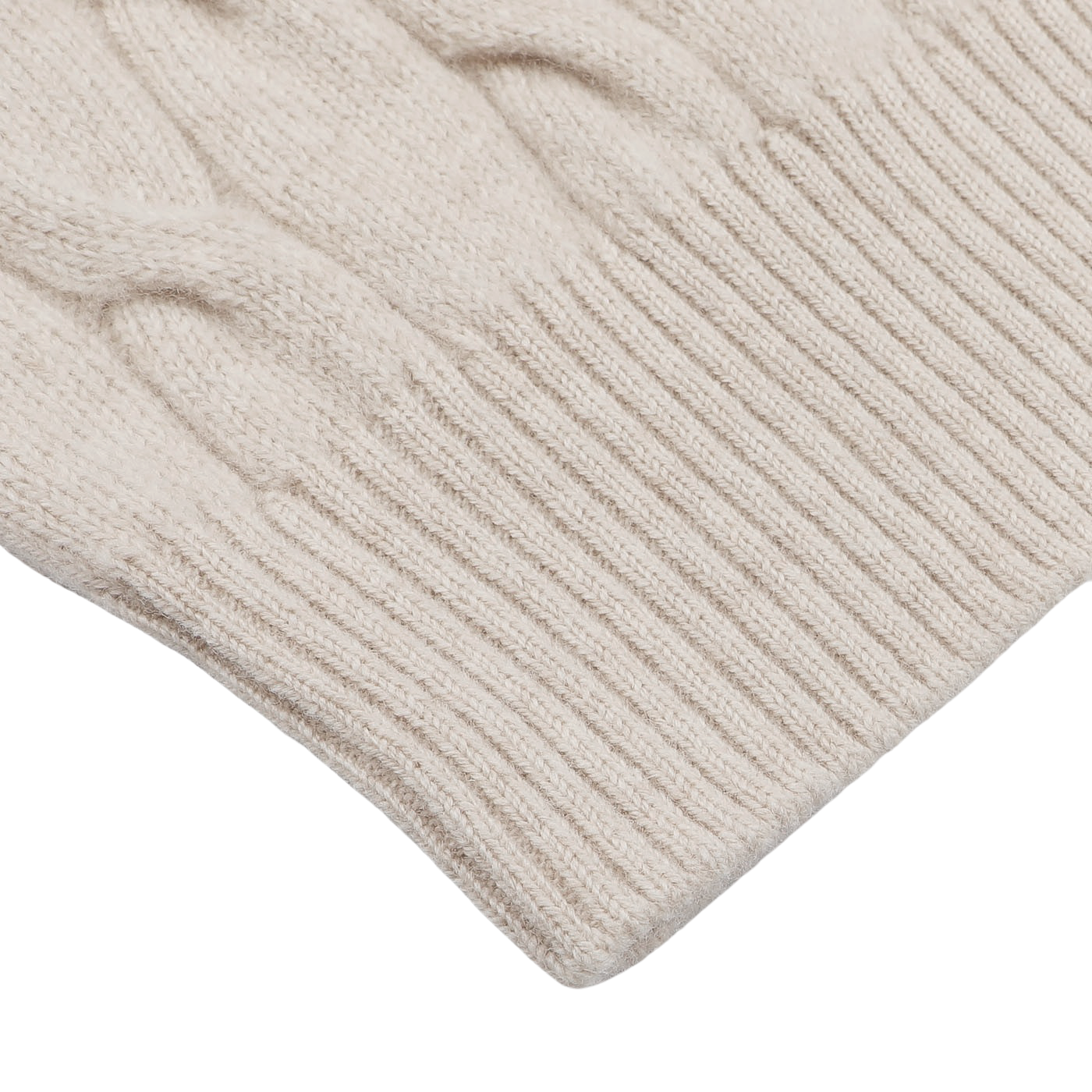 Close-up image of a cream knit cardigan by Filippo de Laurentiis, featuring a ribbed cuff and intricate cable-knitted pattern, showcasing luxurious wool and cashmere blend.