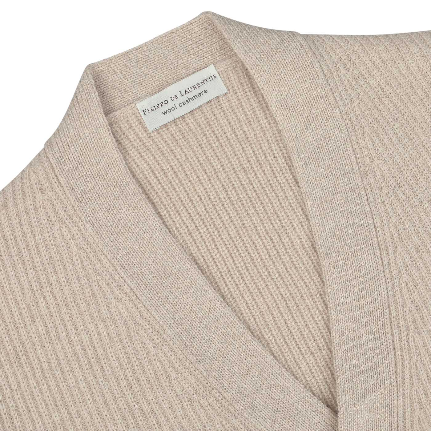 Close-up of the Beige Melange Wool Cashmere Cardigan by Filippo de Laurentiis, made from a blend of beige wool and cashmere. It features a ribbed texture and ribbed hems, with a label that reads "Filippo de Laurentiis.