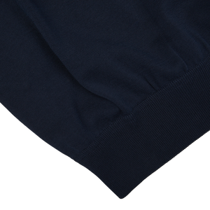A close up of a Filippo de Laurentiis navy blue crepe cotton crew neck sweater.