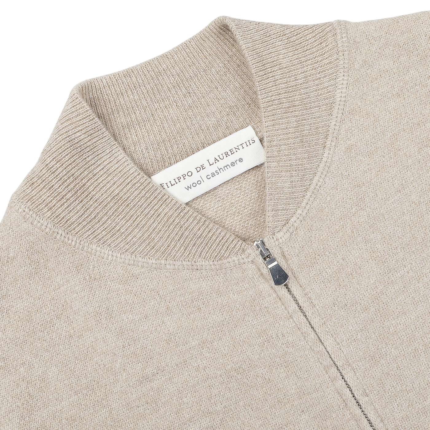 The Taupe Beige Wool Cashmere Knitted Bomber by Filippo de Laurentiis features a ribbed collar and a zip-up front, showcasing the brand’s distinct label.