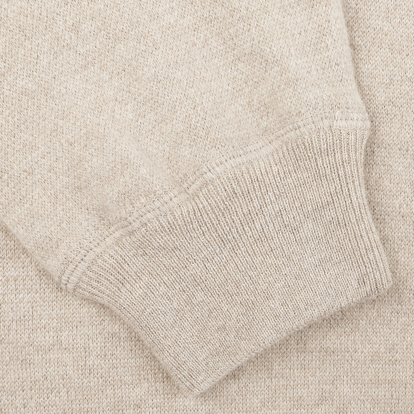 Close-up of the sleeve cuff of the Filippo de Laurentiis Taupe Beige Wool Cashmere Knitted Bomber, showcasing the ribbed texture and fine stitching details.