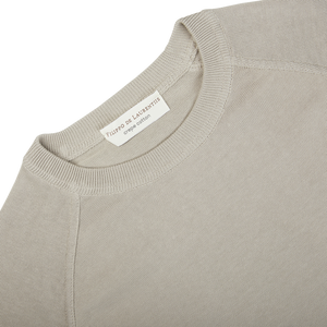 A close up of a Nebbia Grey Crepe Cotton Crew Neck Sweater by Filippo de Laurentiis.