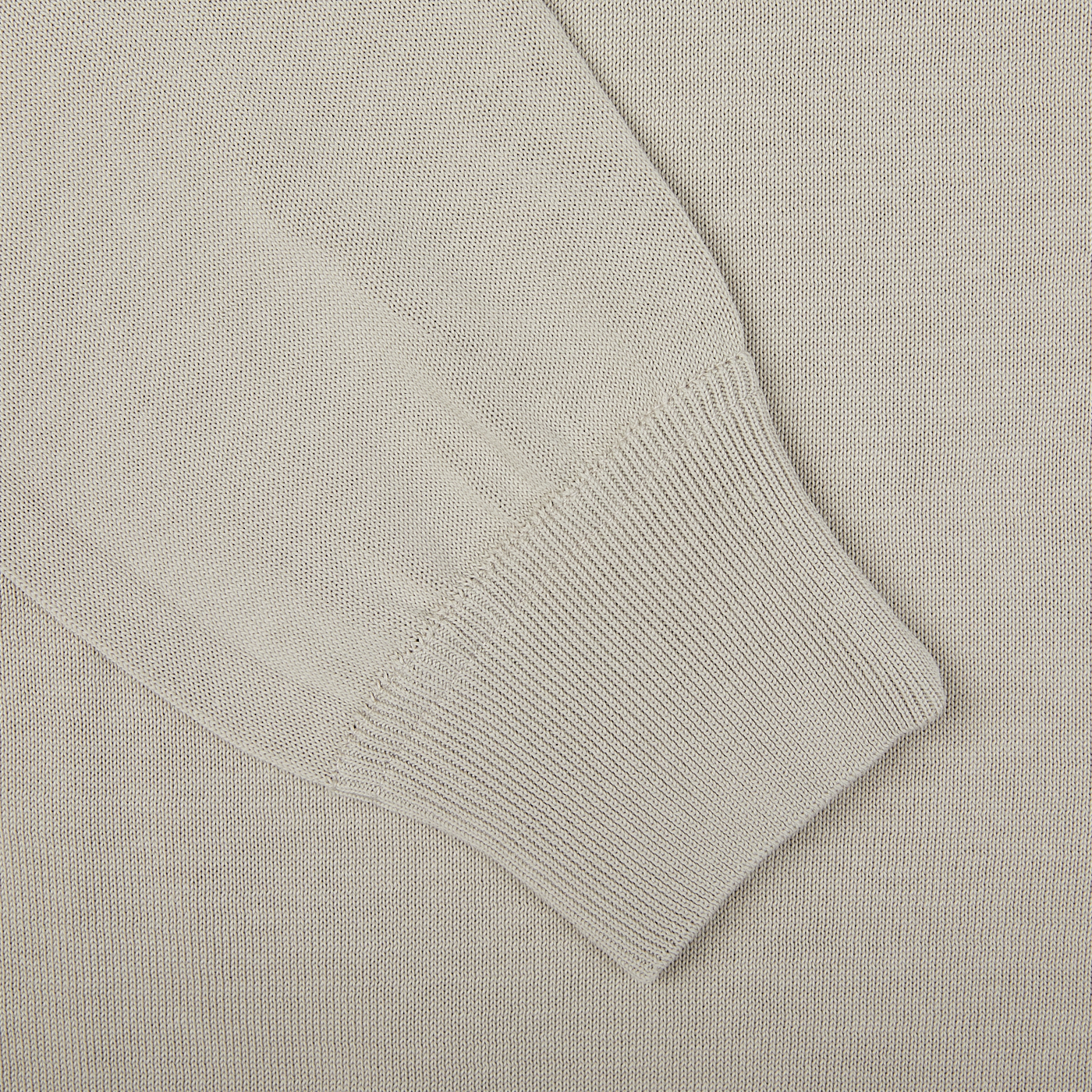 A close-up image of a Nebbia Grey Crepe Cotton Crew Neck Sweater by Filippo de Laurentiis.