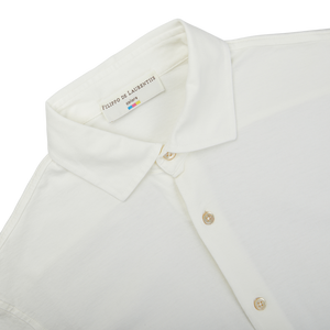 A close up of a slim fit Off White Cotton Jersey Knitted Shirt by Filippo de Laurentiis.