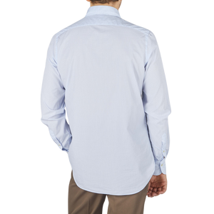 The back view of a man wearing a Finamore Light Blue Cotton Small Check BD Shirt.