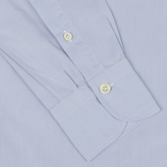 Close-up of the Finamore Light Blue Washed Cotton BD Shirt's cuff and sleeve. The pure cotton cuff features two white buttons and is neatly stitched.