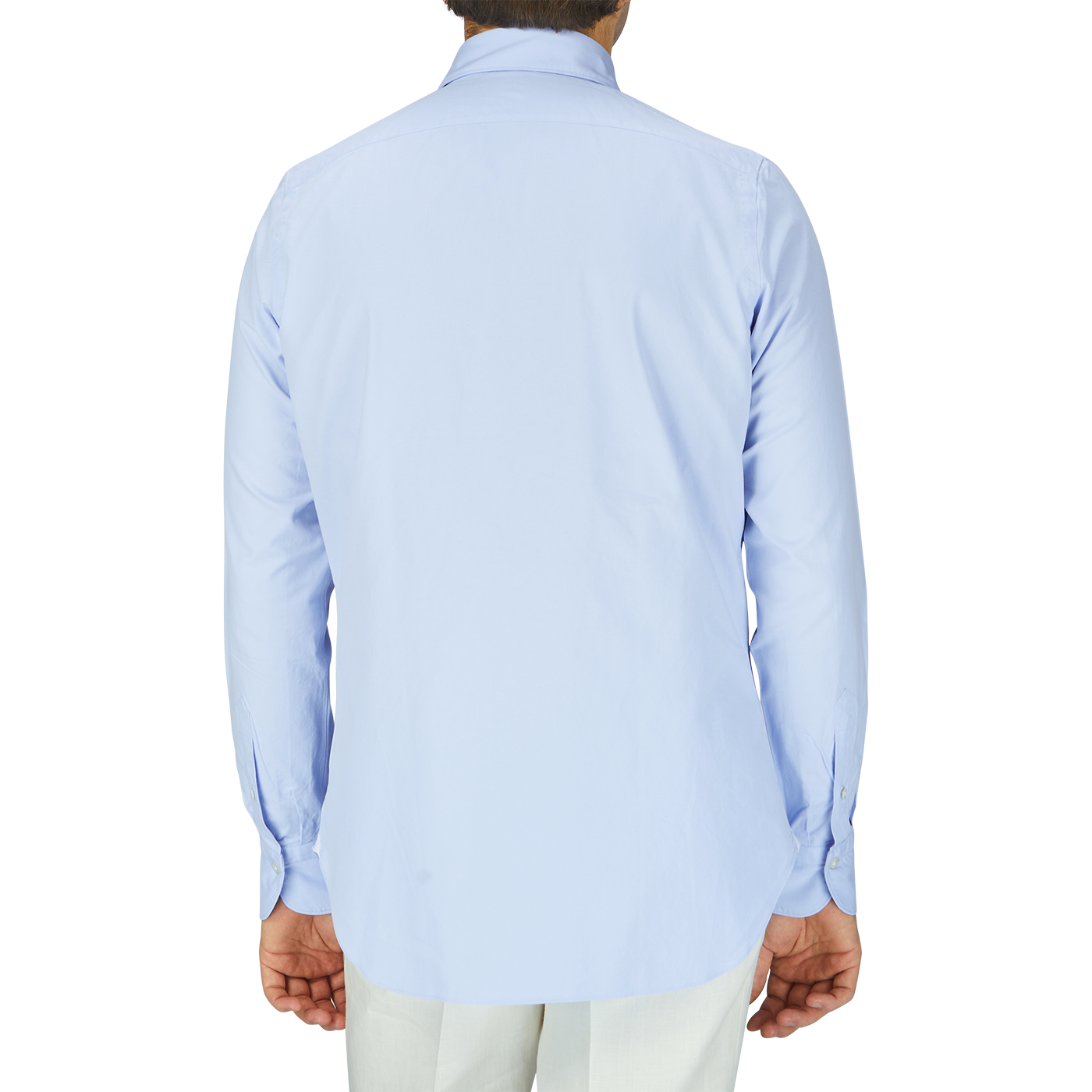 A man wears a Light Blue Washed Cotton Twill shirt by Finamore.