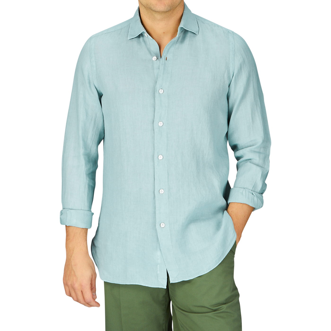 Man wearing a Sage Green Linen Casual Shirt from Finamore and olive pants against a plain background.