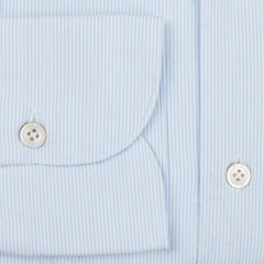 A close up of a Finamore Sky Blue Striped Cotton Seersucker Shirt.