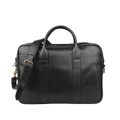 The Frank Clegg Black Tumbled Leather Commuter Briefcase, designed to fit a 15" laptop, is showcased against a plain background. It boasts two sturdy handles and an adjustable shoulder strap for versatile carrying.