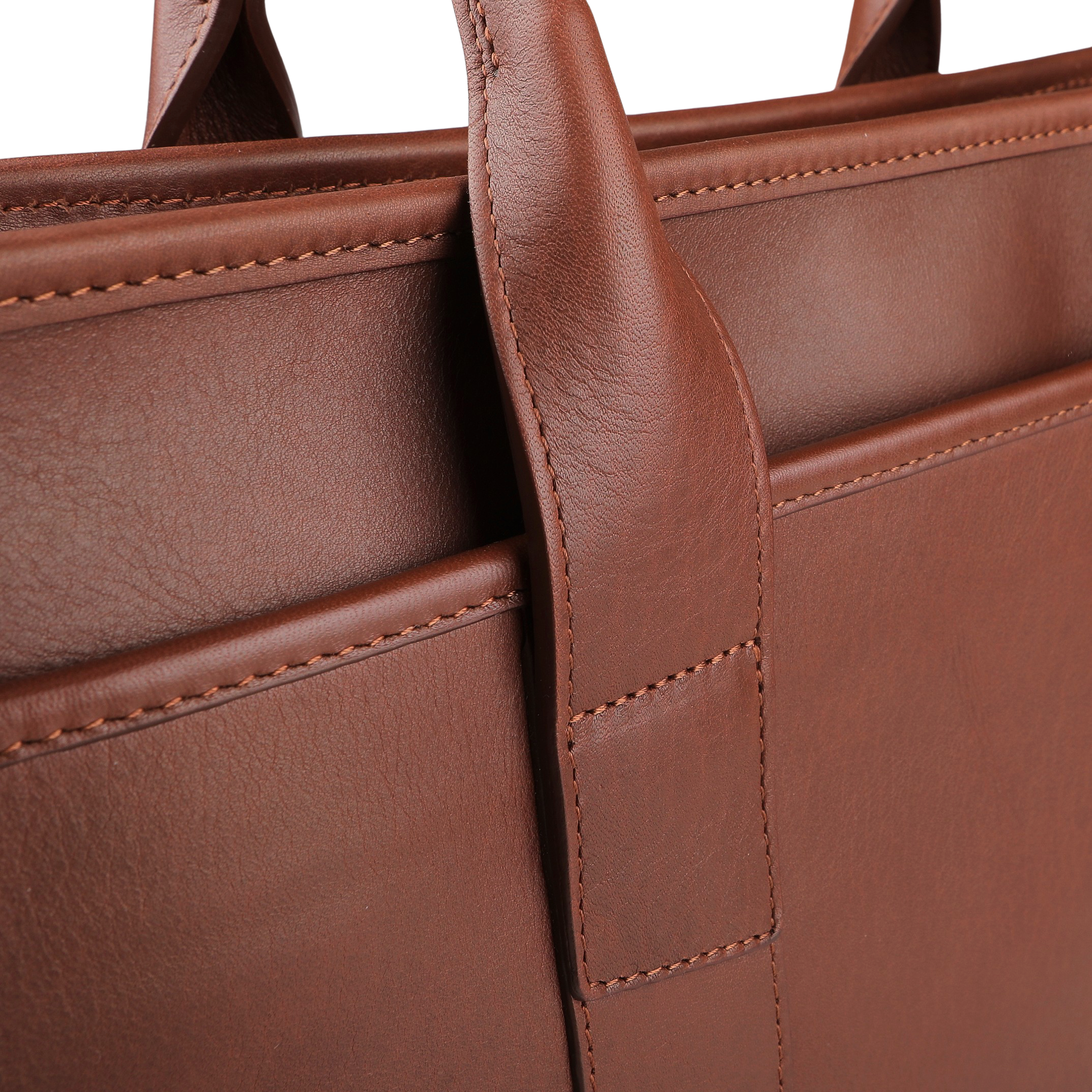 Close-up of the Frank Clegg Chestnut Tumbled Bound Edge Leather Zip Top Briefcase, featuring visible stitching and a sturdy handle loop, designed to fit a 15” laptop.