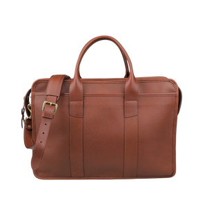 The Frank Clegg Chestnut Tumbled Bound Edge Leather Zip Top Briefcase accommodates a 15" laptop, featuring handles, an adjustable shoulder strap, and brass hardware.