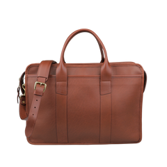 The Frank Clegg Chestnut Tumbled Bound Edge Leather Zip Top Briefcase accommodates a 15" laptop, featuring handles, an adjustable shoulder strap, and brass hardware.