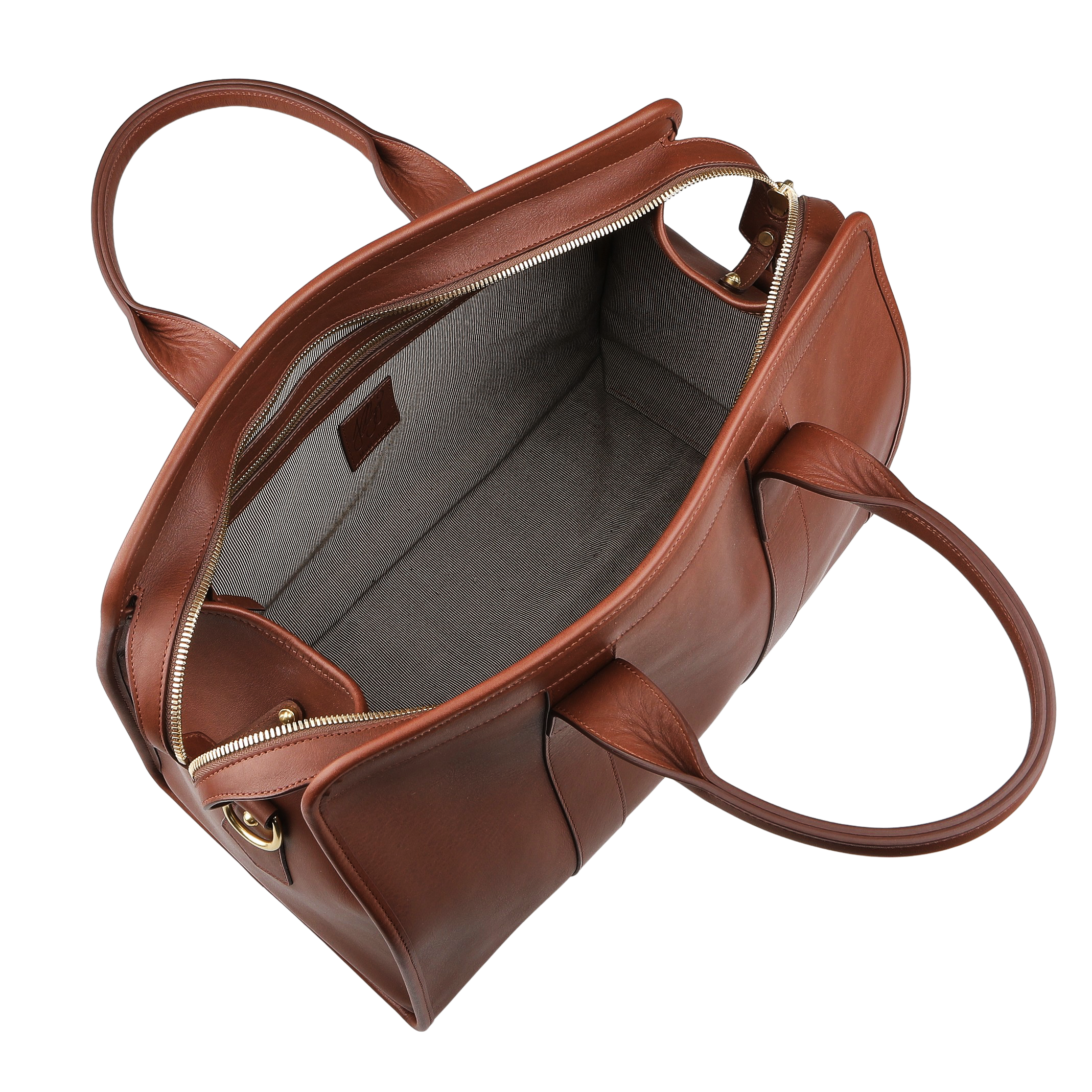 The Chestnut Tumbled Leather Small Travel Duffle by Frank Clegg features a chestnut brown leather exterior, zipper closure, two handles, and a spacious gray interior, ideal as a small travel or weekend bag.