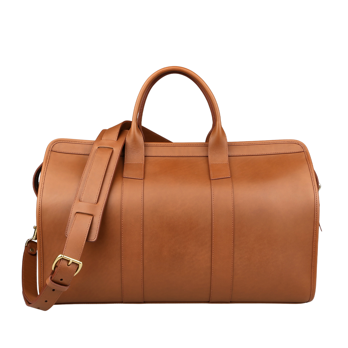 The Frank Clegg Cognac Harness Belting Leather Signature Duffle, featuring a shoulder strap and two handles, is displayed against a neutral background. This luxury travel bag epitomizes handcrafted quality and timeless elegance.