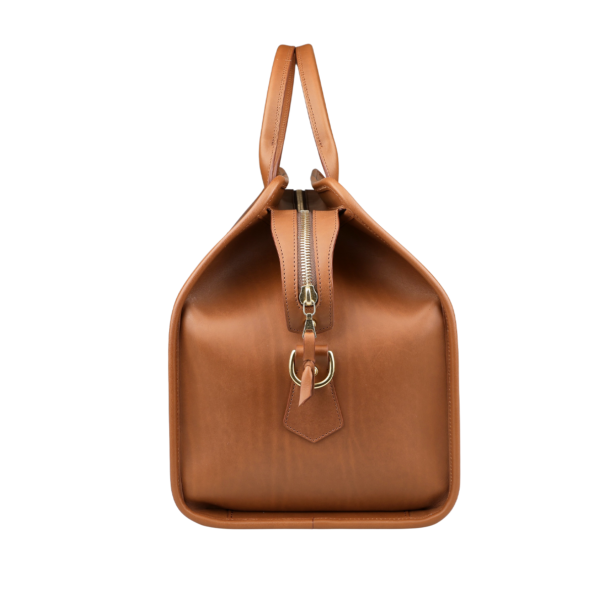 The Cognac Harness Belting Leather Signature Duffle by Frank Clegg features a rich brown leather design with a zipper closure, gold buckle detail, and hand-crafted quality, shown from the side.