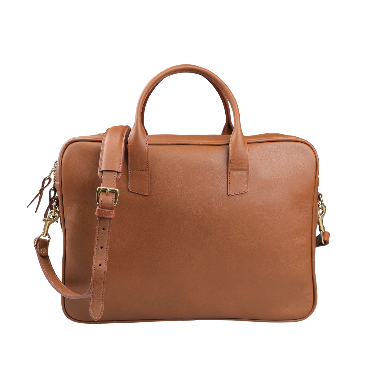 The Cognac Tumbled Leather Computer Briefcase by Frank Clegg is crafted from tumbled calf leather, featuring sturdy handles and an adjustable shoulder strap, perfectly fitting a 15" laptop.