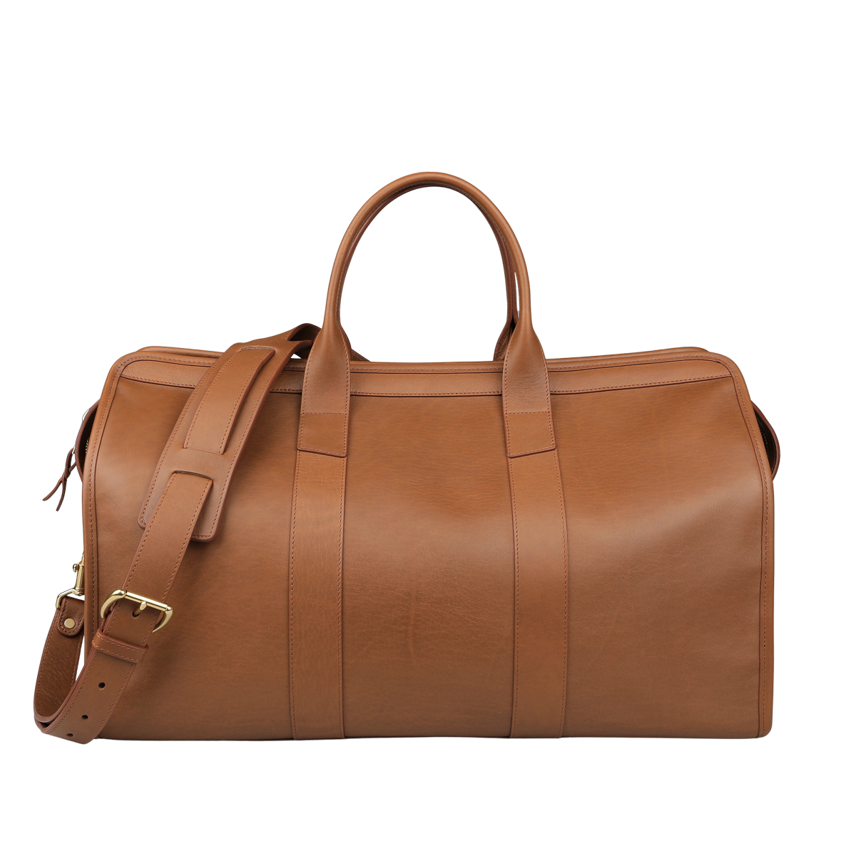 The Cognac Tumbled Leather Signature Duffle by Frank Clegg, a luxurious handcrafted brown leather bag with a shoulder strap and two handles, rests on a plain background.