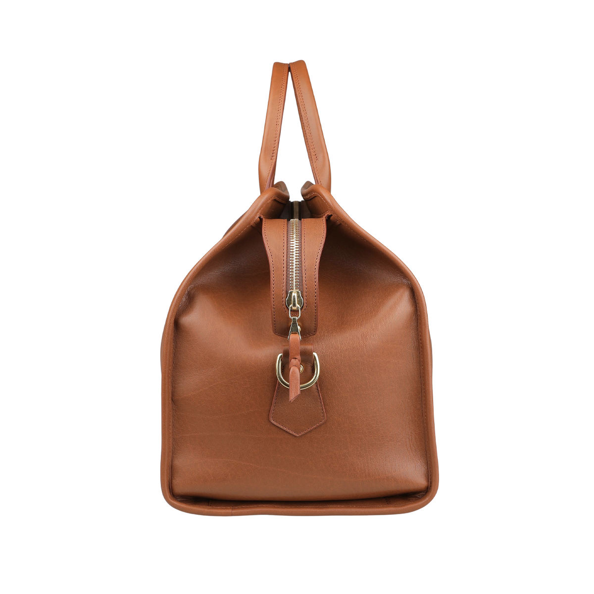 The Cognac Tumbled Leather Signature Duffle by Frank Clegg, displayed front-facing, features top zippers and handles. This elegant brown bag exemplifies luxury travel style for discerning travelers, set against a gray background.